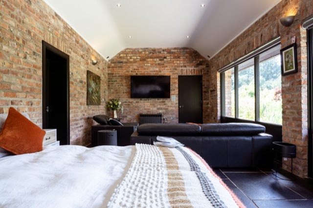 Luxury Lakeview Retreat: View from the bed across the living area