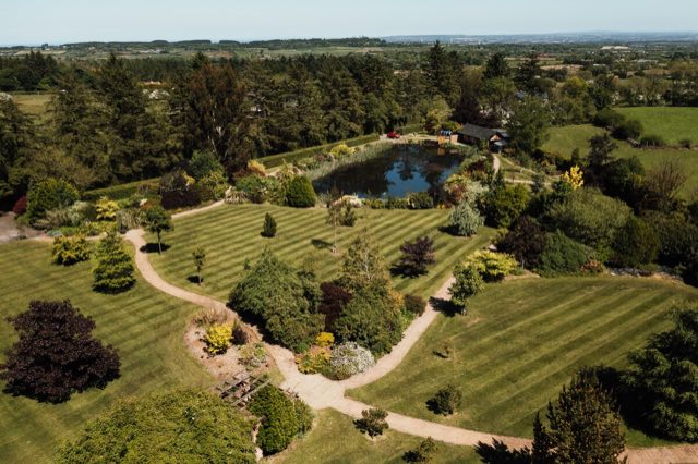 Luxury Lakeview Retreat: Aerial view of the grounds, the lake and the countryside around