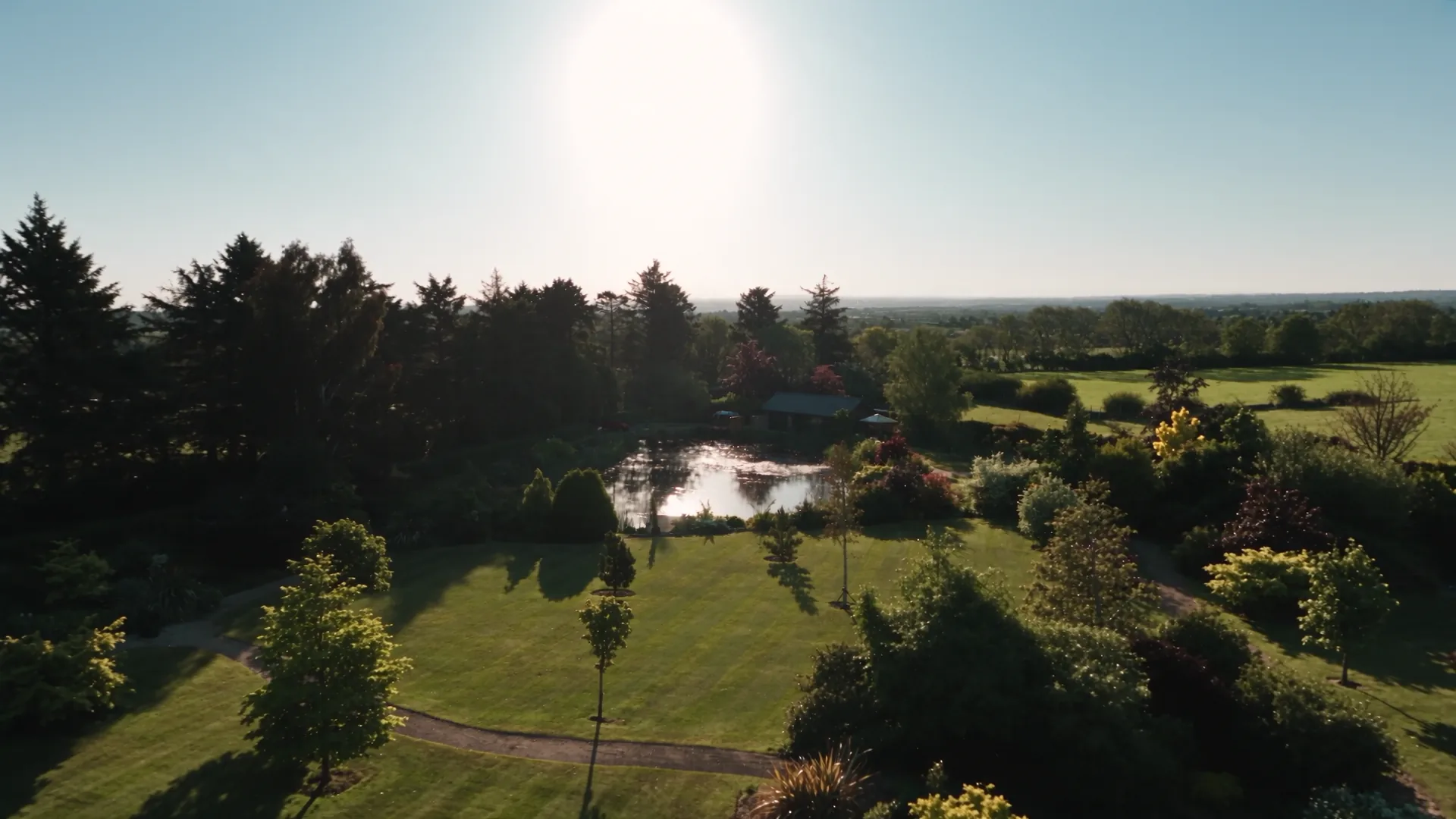 The lake at Springwell Lodges in full afternoon light