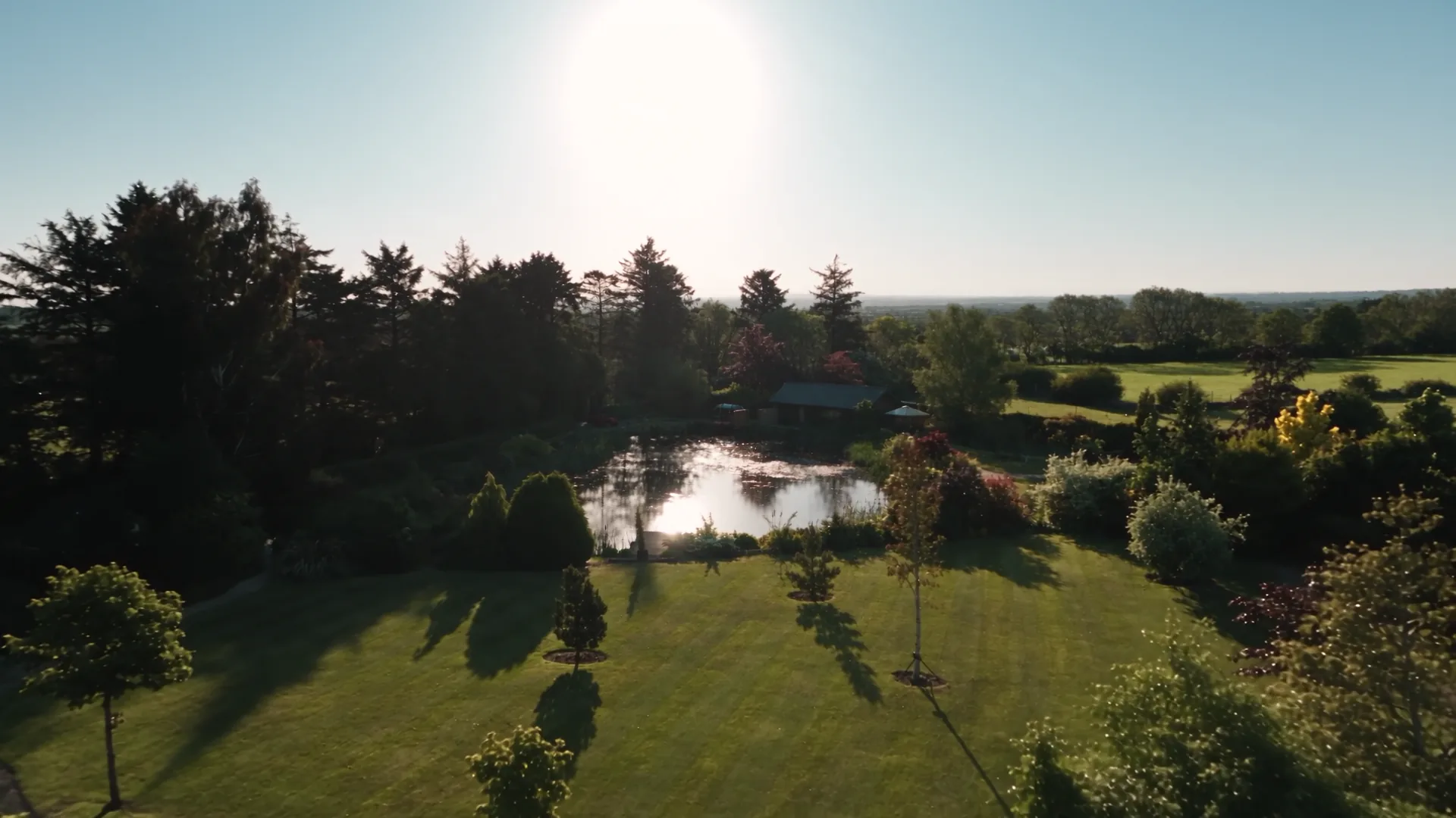 The grounds at Springwell Lodges in afternoon light